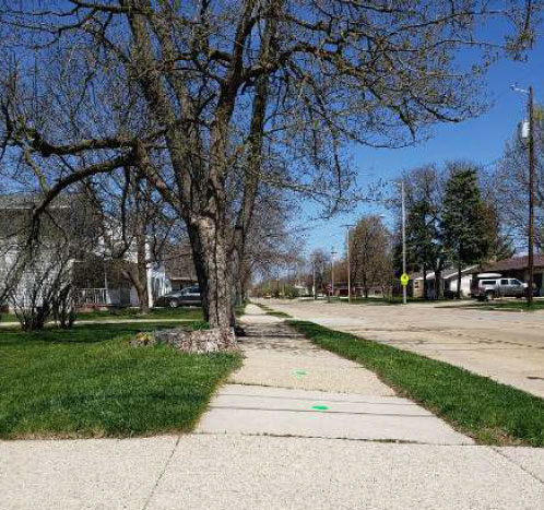 Sidewalk Has Tilted Towards The Road