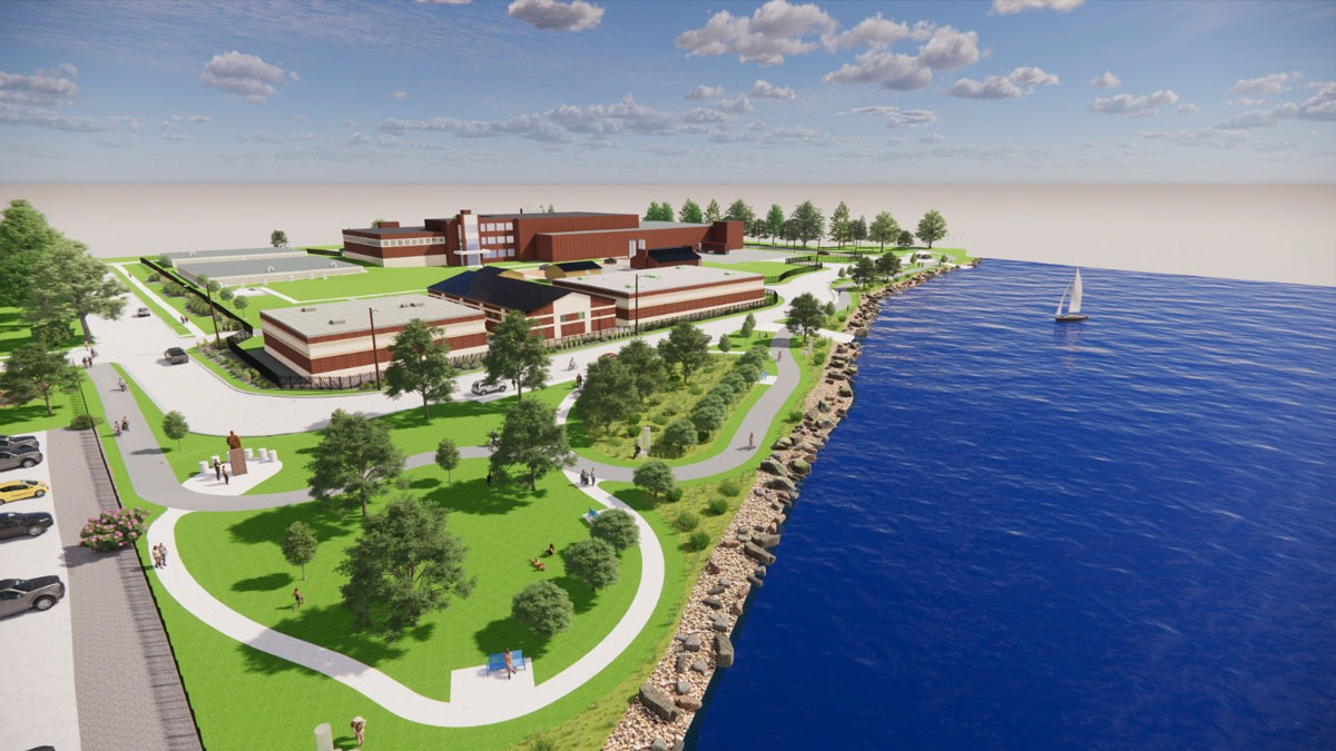 Aerial rendering of a redeveloped waterfront water treatment campus with brick utility buildings, walking paths, trees, landscaped green space, a rocky shoreline and Lake Winnebago to the right.
